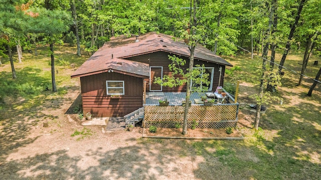 3274 E Rivers Edge, Newaygo, MI 49337 - rear view of property with a wooded view and a deck