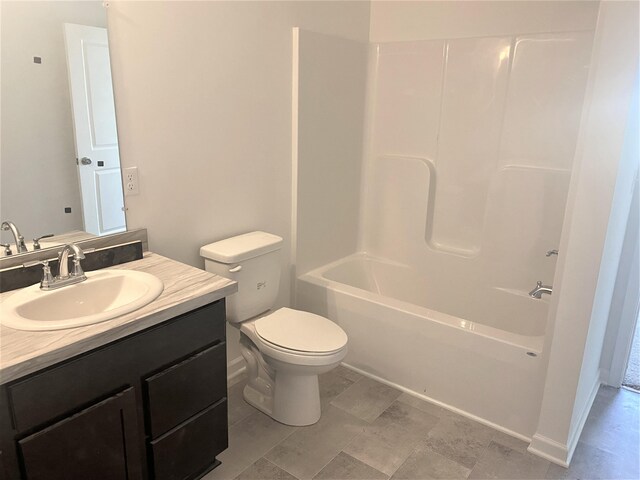 1050 Rebecca St Unit 18, Marshall, MI 49068 - full bath featuring vanity, toilet, and shower / bathtub combination