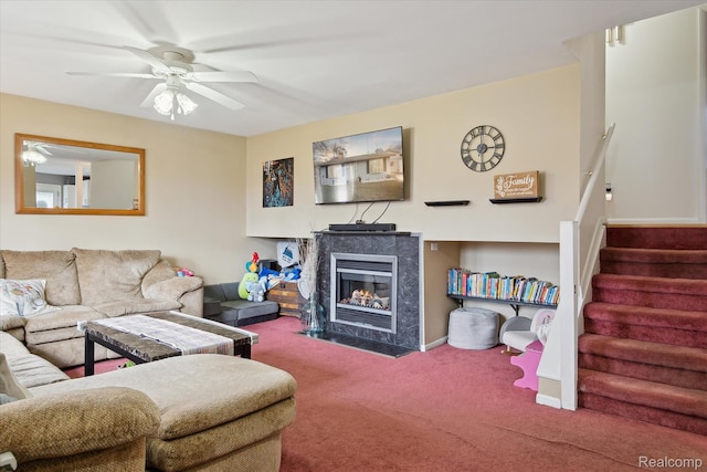 749 Gates Ave, Ypsilanti, MI 48198 - living room featuring carpet, stairs, a high end fireplace, and a ceiling fan