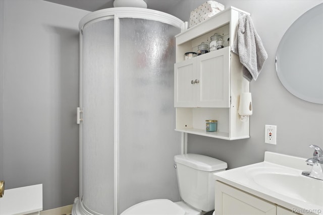 749 Gates Ave, Ypsilanti, MI 48198 - bathroom with vanity, a stall shower, and toilet