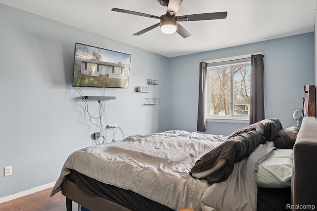 749 Gates Ave, Ypsilanti, MI 48198 - bedroom featuring wood finished floors, baseboards, and a ceiling fan