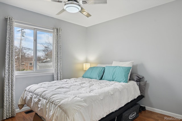 749 Gates Ave, Ypsilanti, MI 48198 - bedroom featuring baseboards, wood finished floors, and a ceiling fan