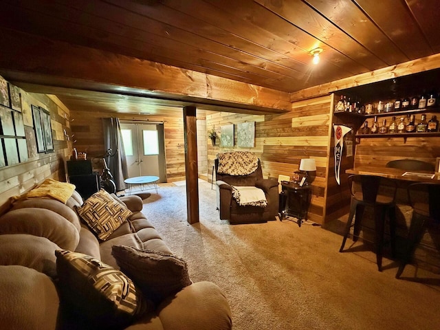 12480 Lone Wolf Trl, Canadian Lakes, MI 49346 - living area featuring wooden walls, wood ceiling, carpet floors, and bar