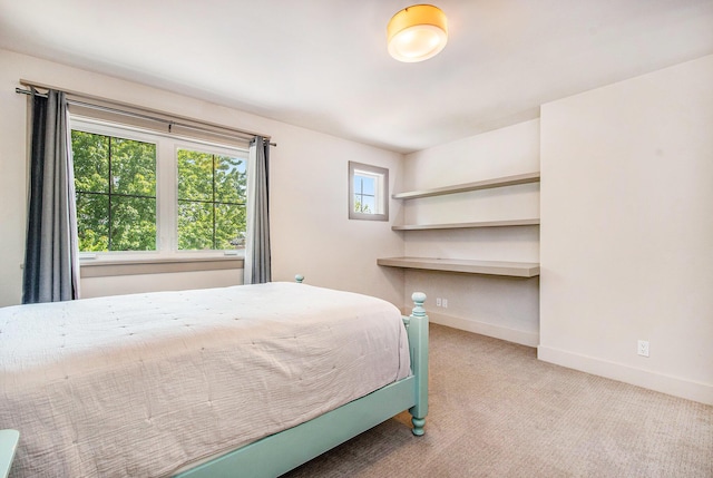 2234 Lake Dr SE, East Grand Rapids, MI 49506 - carpeted bedroom with baseboards