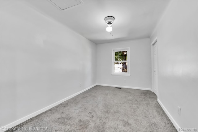20930 Stahelin Rd, Southfield, MI 48075 - carpeted empty room featuring baseboards and attic access