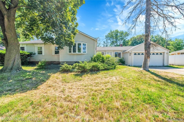 20930 Stahelin Rd, Southfield, MI 48075 - single story home with a front yard, a garage, and driveway