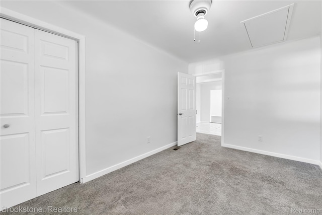 20930 Stahelin Rd, Southfield, MI 48075 - unfurnished bedroom with carpet floors, attic access, a closet, and ceiling fan