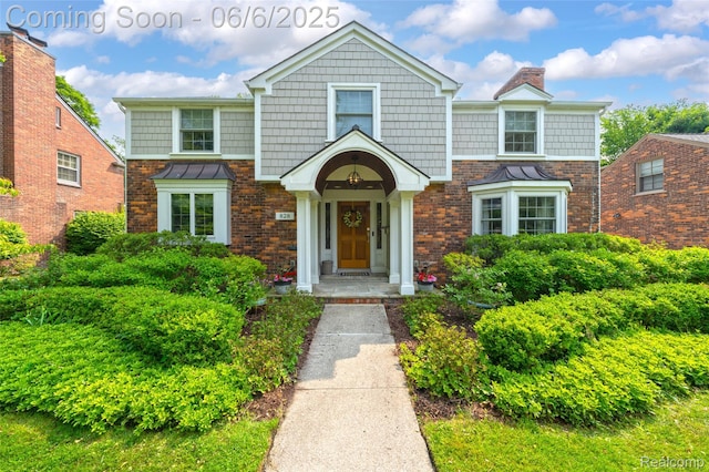 828 Westchester Rd, Grosse Pointe Park, MI 48230 - view of front of home featuring brick siding and a chimney