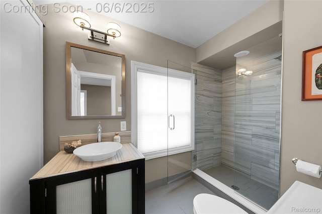 828 Westchester Rd, Grosse Pointe Park, MI 48230 - bathroom featuring a stall shower, vanity, toilet, tile patterned floors, and baseboards