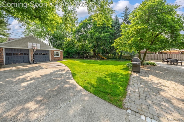 828 Westchester Rd, Grosse Pointe Park, MI 48230 - view of yard featuring a playground, an outdoor structure, and a detached garage