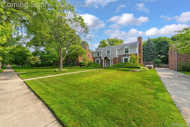 828 Westchester Rd, Grosse Pointe Park, MI 48230 - view of front of property with brick siding and a chimney
