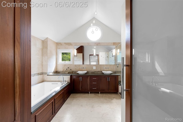 828 Westchester Rd, Grosse Pointe Park, MI 48230 - full bathroom featuring a jetted tub, vaulted ceiling, double vanity, and a shower stall
