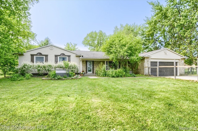 11305 Cook Rd, Gaines, MI 48436 - view of front of house featuring a front lawn and driveway