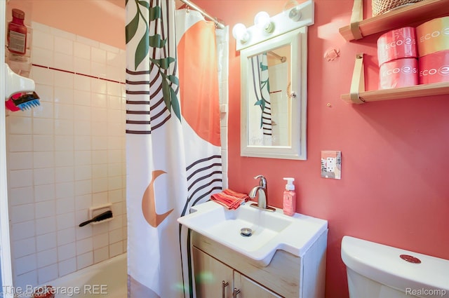 11305 Cook Rd, Gaines, MI 48436 - bathroom with toilet, shower / bathtub combination with curtain, and vanity