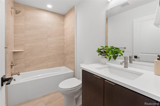 3420 Cochrane St Unit 2, Detroit, MI 48208 - full bath featuring vanity, toilet, bathtub / shower combination, wood finished floors, and recessed lighting
