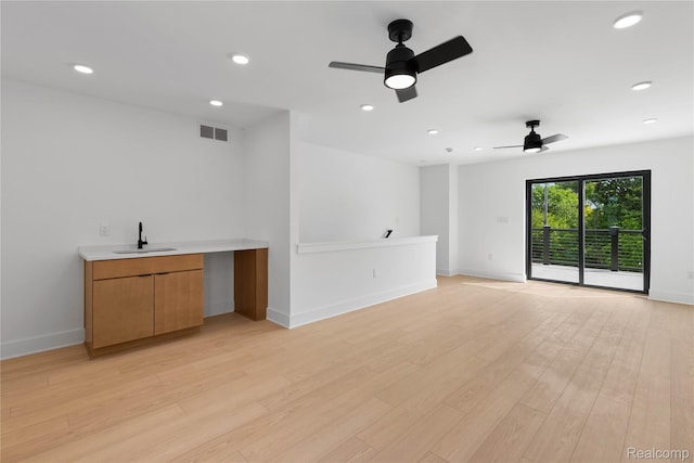 3420 Cochrane St Unit 2, Detroit, MI 48208 - unfurnished room with a sink, ceiling fan, light wood-style floors, recessed lighting, and baseboards