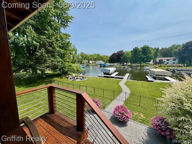 1158 Camelot Dr, Pinckney, MI 48169 - wooden terrace featuring a water view and a dock