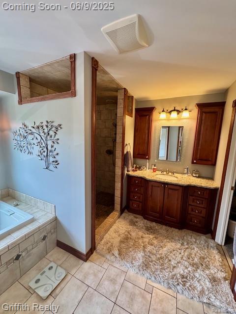 1158 Camelot Dr, Pinckney, MI 48169 - full bathroom featuring vanity, a tile shower, tile patterned flooring, and a garden tub