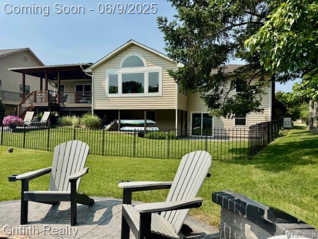1158 Camelot Dr, Pinckney, MI 48169 - view of back of property
