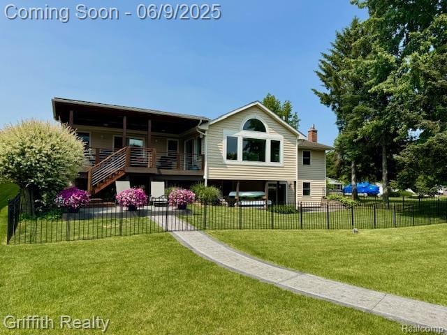 1158 Camelot Dr, Pinckney, MI 48169 - rear view of property featuring a chimney