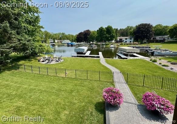 1158 Camelot Dr, Pinckney, MI 48169 - view of yard with a boat dock and a water view