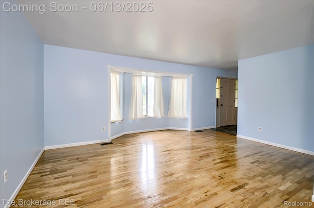 732 E Grand Blanc Rd, Grand Blanc, MI 48439 - spare room with wood finished floors and baseboards
