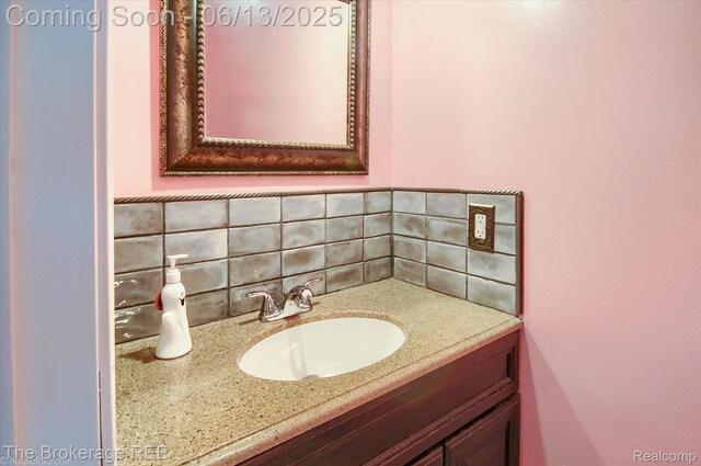 732 E Grand Blanc Rd, Grand Blanc, MI 48439 - bathroom with backsplash and vanity
