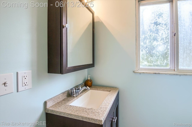 732 E Grand Blanc Rd, Grand Blanc, MI 48439 - bathroom with vanity and healthy amount of natural light