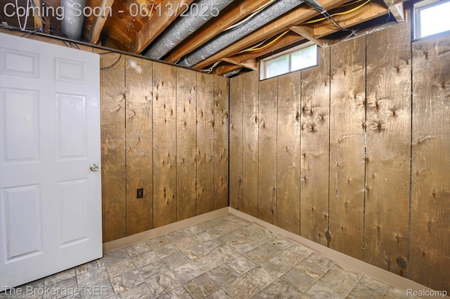 732 E Grand Blanc Rd, Grand Blanc, MI 48439 - basement featuring wooden walls