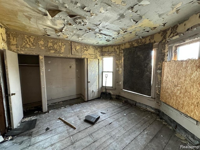 691 Clairmount St, Detroit, MI 48202 - unfurnished bedroom featuring two closets