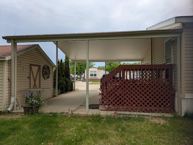 4153 Whisperwood Way S, Muskegon, MI 49442 - view of parking / parking lot with a carport