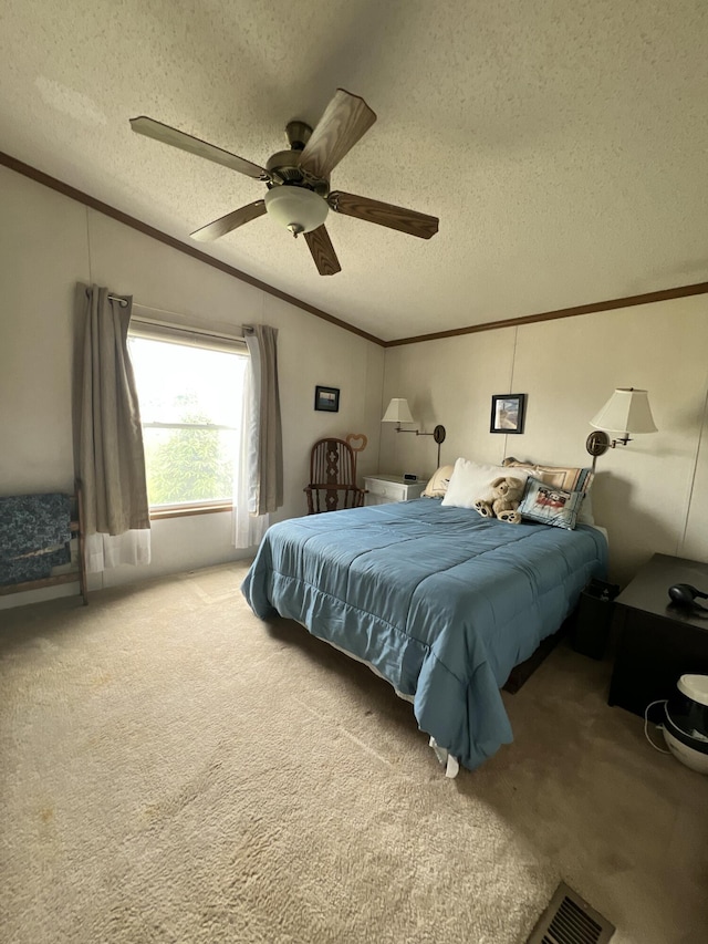 4153 Whisperwood Way S, Muskegon, MI 49442 - carpeted bedroom with crown molding, a textured ceiling, and ceiling fan
