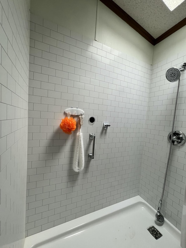 4153 Whisperwood Way S, Muskegon, MI 49442 - full bathroom featuring ornamental molding and a tile shower