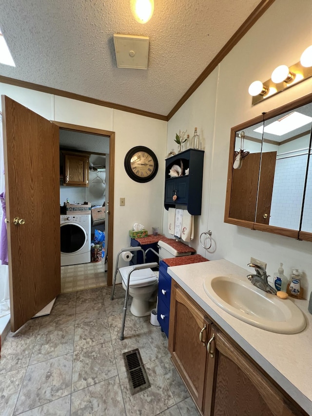 4153 Whisperwood Way S, Muskegon, MI 49442 - bathroom with washer / clothes dryer, ornamental molding, vanity, a textured ceiling, and toilet