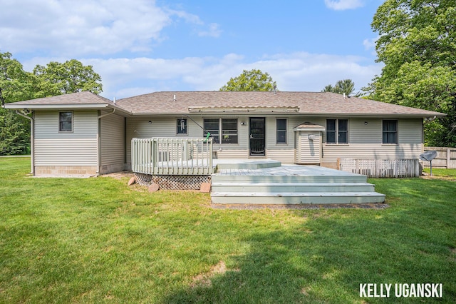 7460 Anthony St, Whitehall, MI 49461 - rear view of property with a yard, a wooden deck, and roof with shingles
