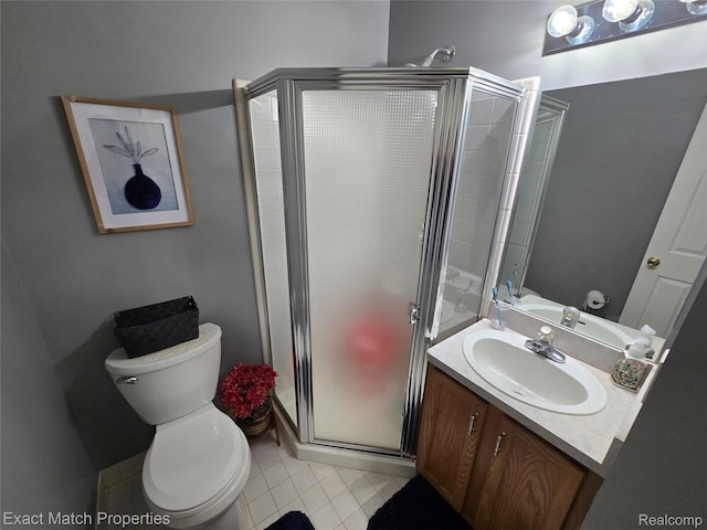 45009 Mitchell St, Grand Blanc, MI 48439 - bathroom with vanity, a shower stall, toilet, and tile patterned flooring
