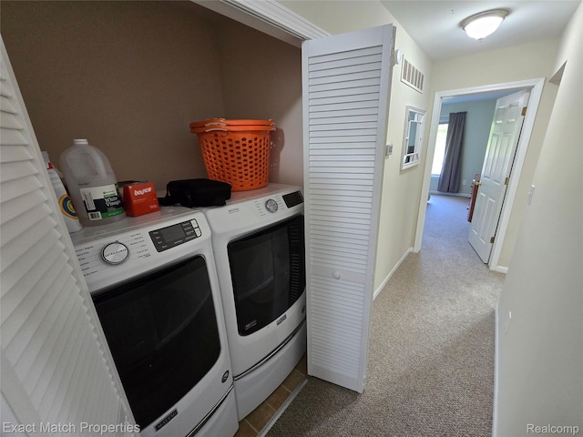 45009 Mitchell St, Grand Blanc, MI 48439 - laundry room featuring separate washer and dryer, carpet flooring, and baseboards