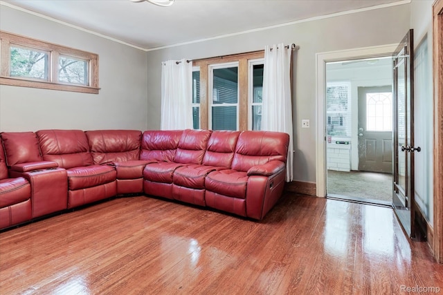 2210 Cambridge Rd, Berkley, MI 48072 - living area featuring crown molding, wood finished floors, and plenty of natural light
