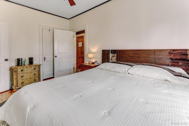 2210 Cambridge Rd, Berkley, MI 48072 - bedroom with wood finished floors, ceiling fan, and crown molding
