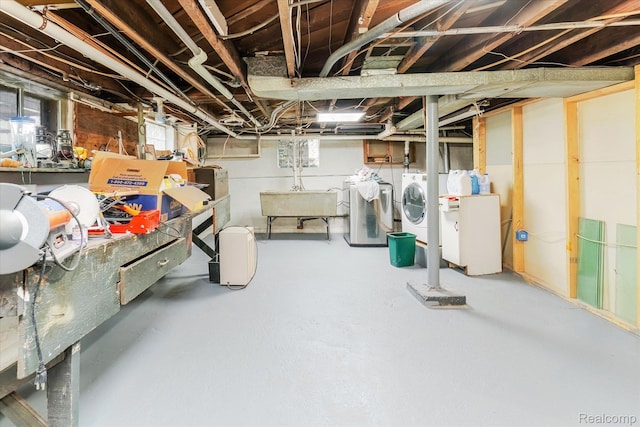 2210 Cambridge Rd, Berkley, MI 48072 - unfinished basement featuring independent washer and dryer and a sink