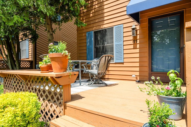 5576 N Watervliet Rd Unit 11, Watervliet, MI 49098 - deck featuring outdoor dining area