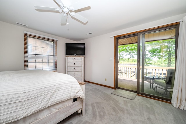 5576 N Watervliet Rd Unit 11, Watervliet, MI 49098 - bedroom featuring access to exterior, light carpet, baseboards, and ceiling fan