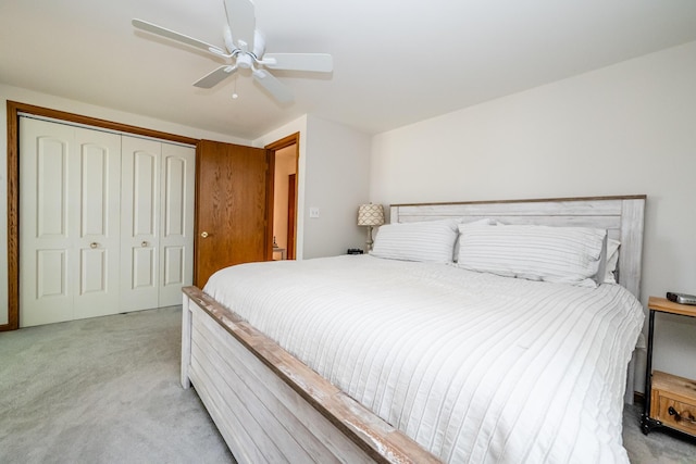 5576 N Watervliet Rd Unit 11, Watervliet, MI 49098 - bedroom featuring light colored carpet, a closet, and ceiling fan