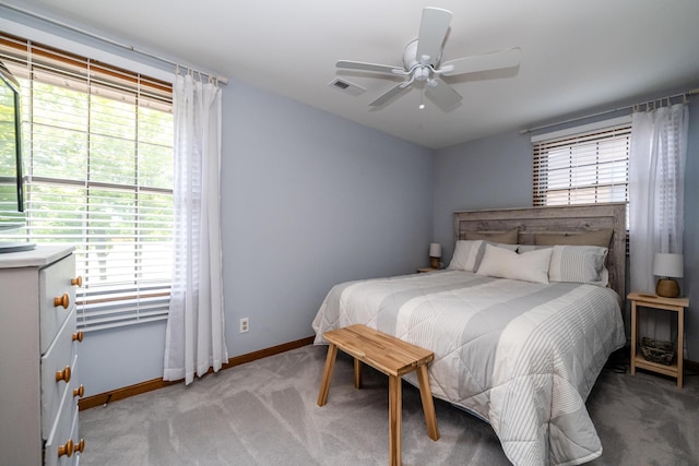 5576 N Watervliet Rd Unit 11, Watervliet, MI 49098 - bedroom featuring light colored carpet, baseboards, and a ceiling fan