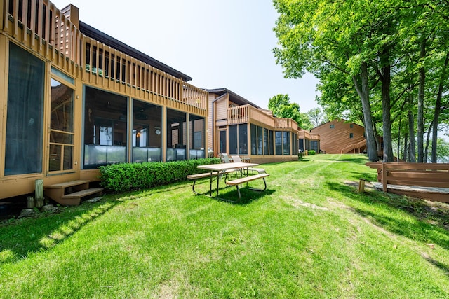 5576 N Watervliet Rd Unit 11, Watervliet, MI 49098 - view of grassy yard featuring a sunroom