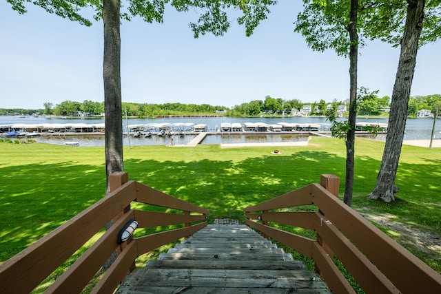 5576 N Watervliet Rd Unit 11, Watervliet, MI 49098 - dock area featuring a water view and a yard