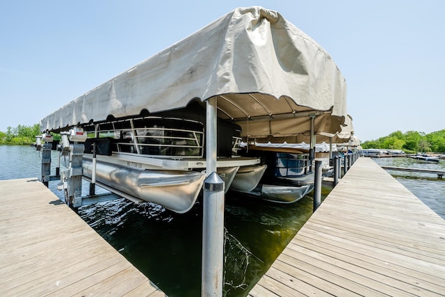 5576 N Watervliet Rd Unit 11, Watervliet, MI 49098 - dock featuring boat lift and a water view