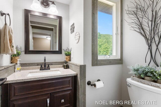 16507 Sleeper St, Grand Haven, MI 49417 - half bath featuring toilet and vanity