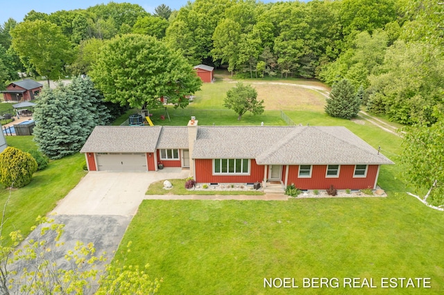 16507 Sleeper St, Grand Haven, MI 49417 - view of front of house featuring a shingled roof, driveway, a garage, a front lawn, and crawl space