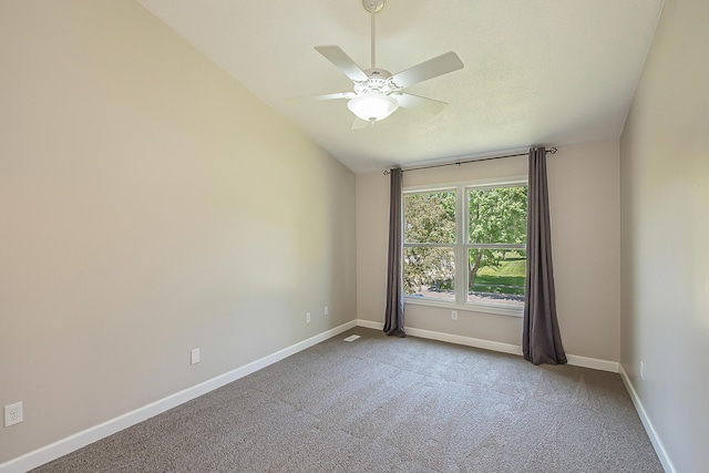 1196 Rathfon Cir, Saline, MI 48176 - spare room with carpet floors, baseboards, a ceiling fan, and vaulted ceiling